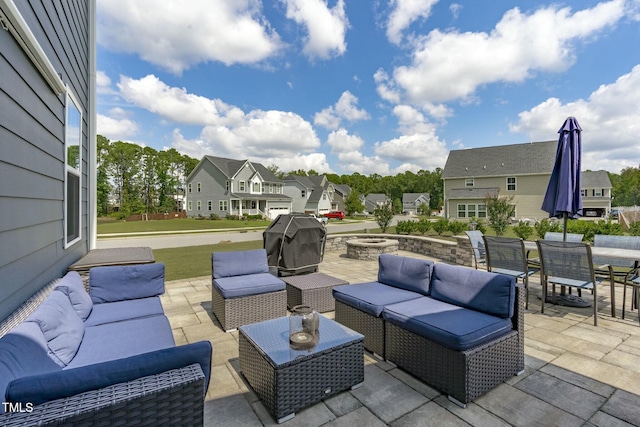 2801 Landon Ridge Dr, New Hill, NC 27562 - view of patio with grilling area, a residential view, and an outdoor living space with a fire pit