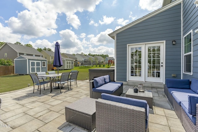 2801 Landon Ridge Dr, New Hill, NC 27562 - view of patio / terrace featuring outdoor dining space, an outbuilding, an outdoor living space, a storage unit, and a residential view