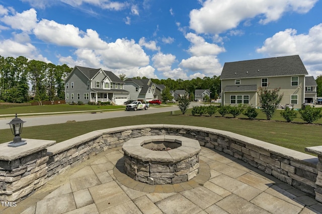 2801 Landon Ridge Dr, New Hill, NC 27562 - view of patio with a residential view and an outdoor fire pit