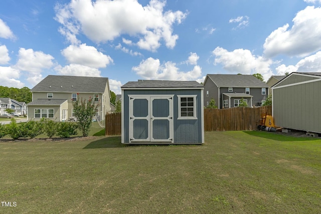 2801 Landon Ridge Dr, New Hill, NC 27562 - view of shed featuring fence and a residential view