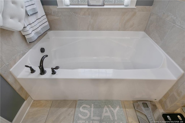 full bath featuring a garden tub
