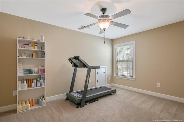 workout area with carpet floors, baseboards, and ceiling fan