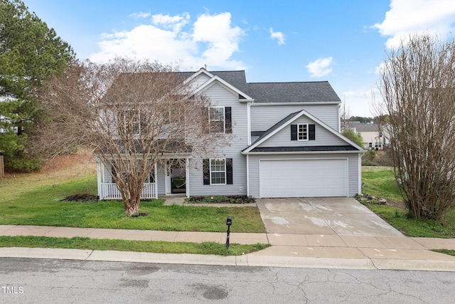 view of front of house with driveway, a garage, a porch, and a front yard