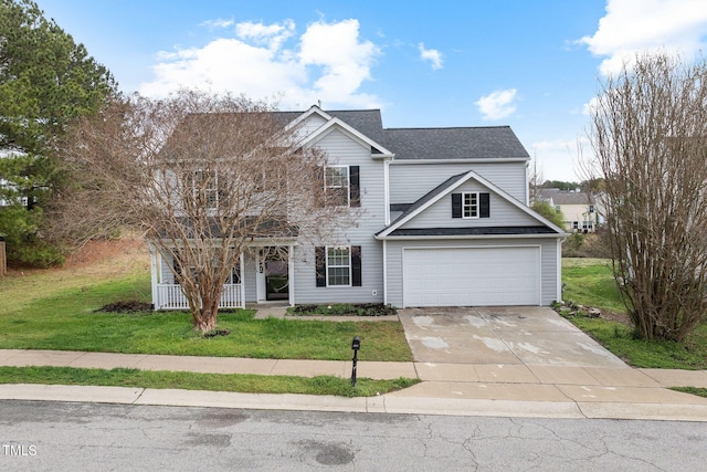 traditional-style home featuring driveway, covered porch, and a front lawn
