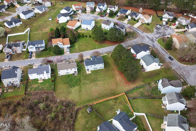 birds eye view of property with a residential view