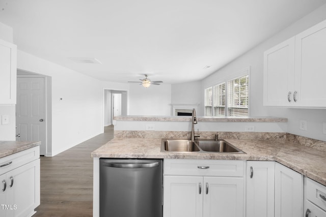 kitchen featuring light countertops, a sink, white cabinetry, dishwasher, and ceiling fan