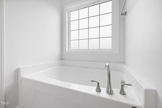 bathroom featuring a bath