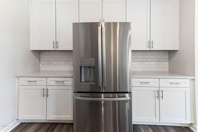 2137 Caen St, Raleigh, NC 27610 - kitchen with stainless steel fridge, light countertops, and backsplash
