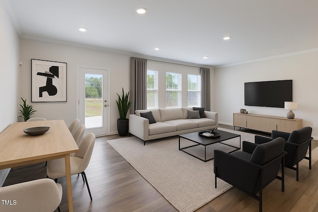 2137 Caen St, Raleigh, NC 27610 - living room with ornamental molding, wood finished floors, and recessed lighting
