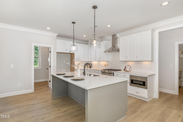 503 Forest Rd, Oxford, NC 27565 - kitchen with wall chimney range hood, high end stainless steel range, decorative backsplash, white cabinetry, and light countertops