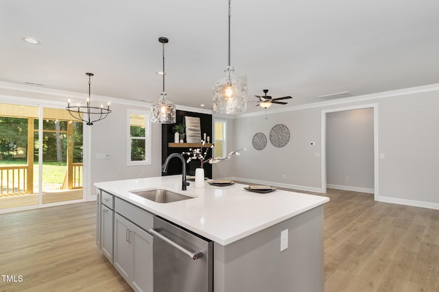 503 Forest Rd, Oxford, NC 27565 - kitchen featuring dishwasher, crown molding, light countertops, an island with sink, and light wood-style floors
