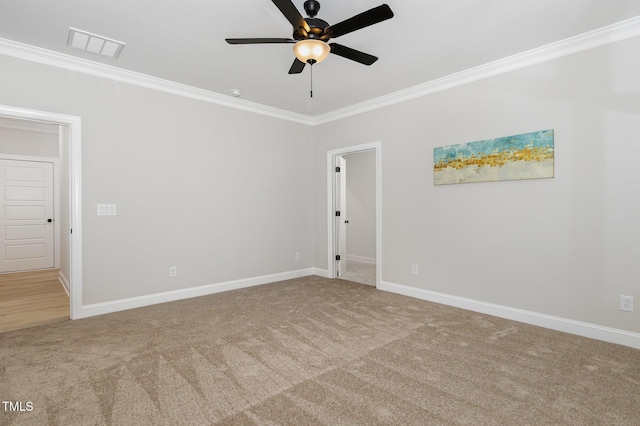 503 Forest Rd, Oxford, NC 27565 - empty room featuring carpet, ornamental molding, and ceiling fan