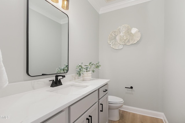503 Forest Rd, Oxford, NC 27565 - half bath featuring ornamental molding, vanity, and wood finished floors