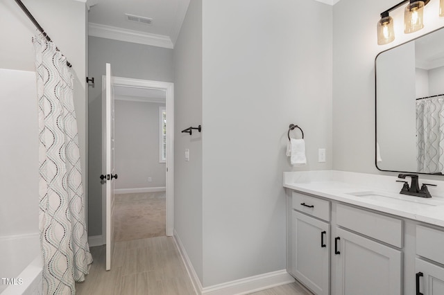 503 Forest Rd, Oxford, NC 27565 - bathroom featuring vanity, ornamental molding, and shower / tub combo with curtain