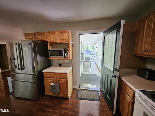 4116 Tall Pine Dr, Franklinton, NC 27525 - kitchen featuring stainless steel appliances, light countertops, and dark wood-style floors