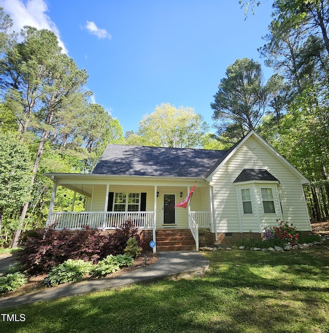 4116 Tall Pine Dr, Franklinton, NC 27525 - view of front of house with a porch, crawl space, a shingled roof, and a front yard