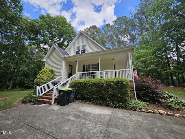 4116 Tall Pine Dr, Franklinton, NC 27525 - view of front of home with covered porch and stairway