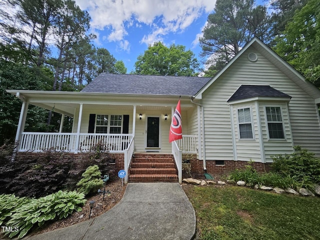 4116 Tall Pine Dr, Franklinton, NC 27525 - view of front of property featuring a porch, roof with shingles, and crawl space