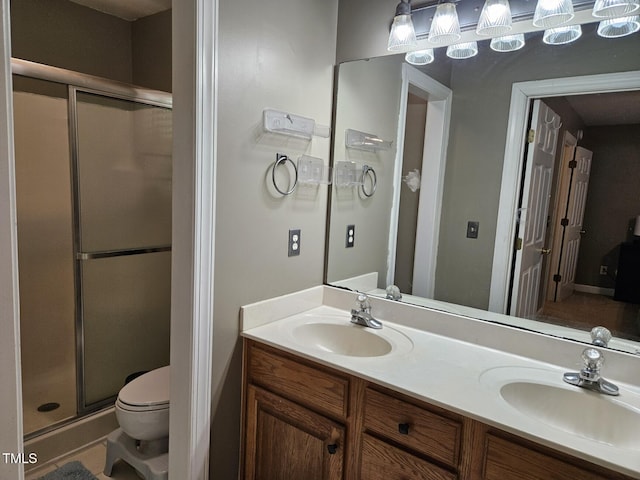 4116 Tall Pine Dr, Franklinton, NC 27525 - bathroom with a shower stall, toilet, and double vanity