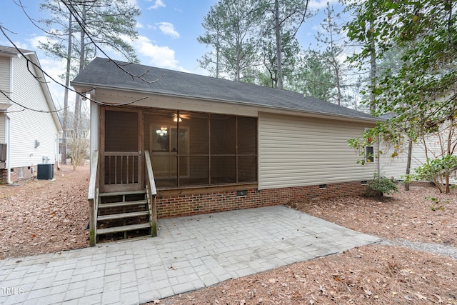 1603 Stonegate S, Sanford, NC 27332 - exterior space featuring a sunroom, a patio, crawl space, roof with shingles, and cooling unit