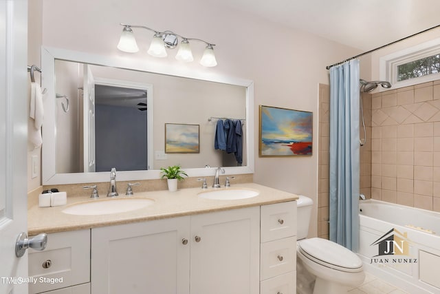 1603 Stonegate S, Sanford, NC 27332 - bathroom with double vanity, shower / tub combo, toilet, and a sink