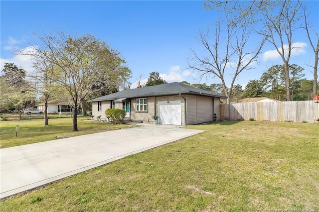 1002 Hicks Ave, Fayetteville, NC 28304 - single story home with a front lawn, fence, an attached garage, and concrete driveway