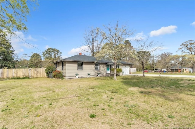 1002 Hicks Ave, Fayetteville, NC 28304 - exterior space featuring a lawn, driveway, an attached garage, and fence