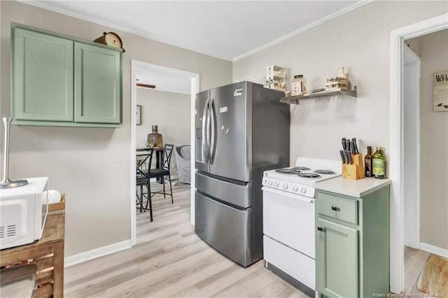 1002 Hicks Ave, Fayetteville, NC 28304 - kitchen featuring white appliances, green cabinetry, light wood-style floors, and ornamental molding
