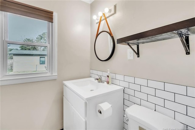 1002 Hicks Ave, Fayetteville, NC 28304 - half bath with tile walls, toilet, and vanity