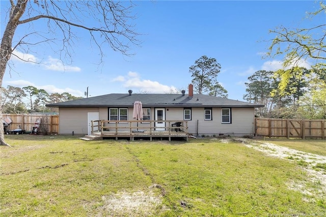 1002 Hicks Ave, Fayetteville, NC 28304 - back of property featuring a fenced backyard, a yard, and a deck