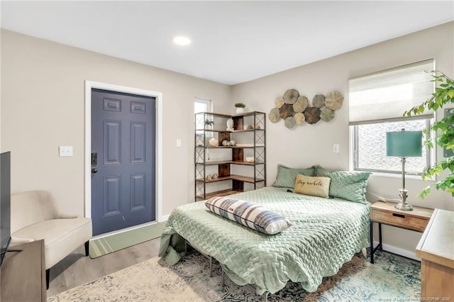 1002 Hicks Ave, Fayetteville, NC 28304 - bedroom featuring baseboards and wood finished floors