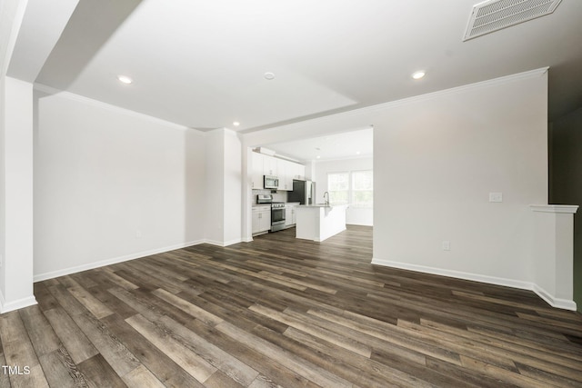 3025 Castle Loch Ln, Durham, NC 27703 - unfurnished living room featuring crown molding, dark wood-style flooring, recessed lighting, a sink, and baseboards