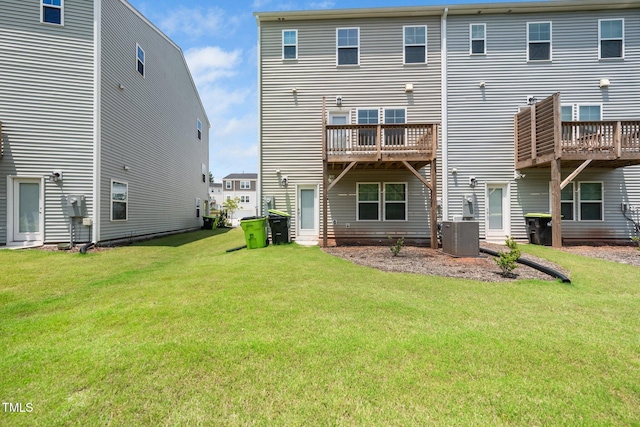 3025 Castle Loch Ln, Durham, NC 27703 - rear view of property featuring a lawn and central air condition unit