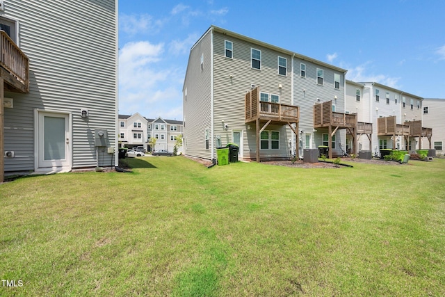 3025 Castle Loch Ln, Durham, NC 27703 - back of property featuring a lawn, cooling unit, and a residential view