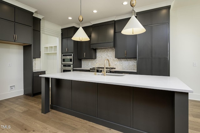 8620 Dukes Lake Rd, Zebulon, NC 27597 - kitchen featuring recessed lighting, light wood finished floors, tasteful backsplash, light countertops, and pendant lighting