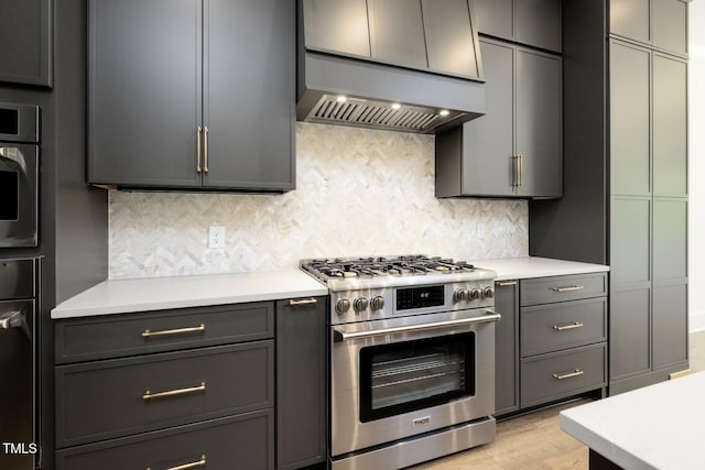 8620 Dukes Lake Rd, Zebulon, NC 27597 - kitchen featuring high end stainless steel range, custom exhaust hood, and light countertops