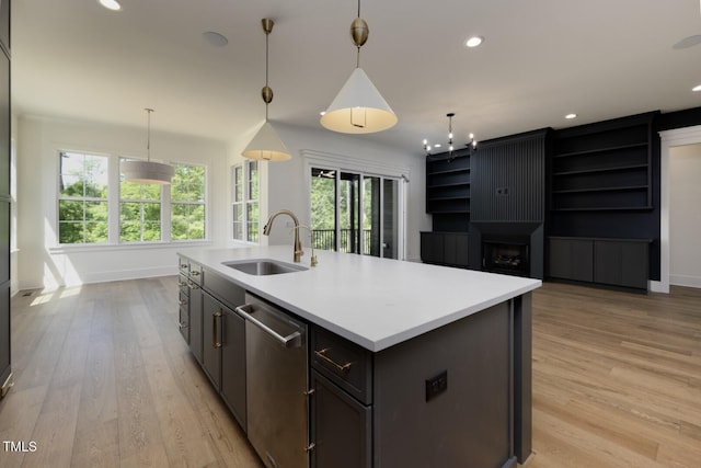 8620 Dukes Lake Rd, Zebulon, NC 27597 - kitchen with stainless steel dishwasher, plenty of natural light, light wood-style flooring, and recessed lighting
