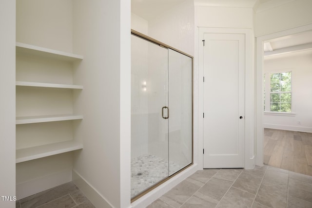 8620 Dukes Lake Rd, Zebulon, NC 27597 - full bathroom featuring a shower stall and built in shelves