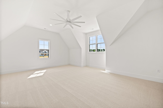 8620 Dukes Lake Rd, Zebulon, NC 27597 - additional living space with lofted ceiling, healthy amount of natural light, light colored carpet, ceiling fan, and recessed lighting