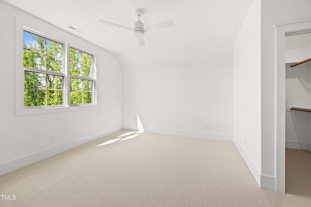 8620 Dukes Lake Rd, Zebulon, NC 27597 - unfurnished bedroom with carpet floors, ceiling fan, and vaulted ceiling