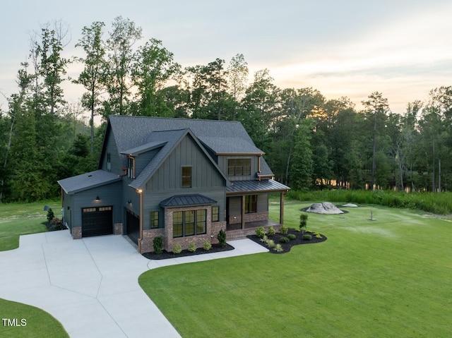 8620 Dukes Lake Rd, Zebulon, NC 27597 - view of front of home with a porch, board and batten siding, and a front lawn