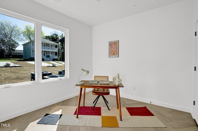 office area featuring baseboards