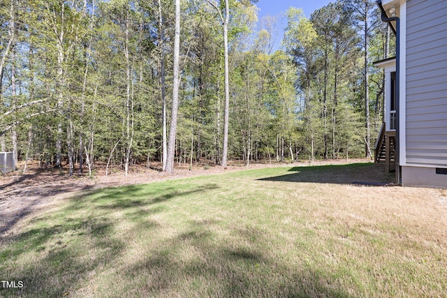 50 Gadwall Ct, Zebulon, NC 27597 - view of yard featuring a view of trees