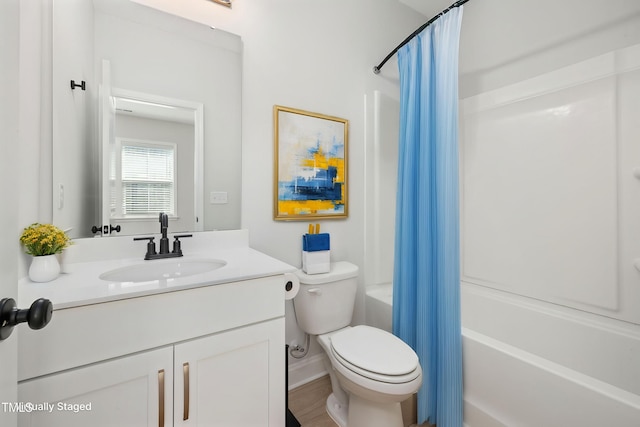50 Gadwall Ct, Zebulon, NC 27597 - bathroom featuring vanity, toilet, and shower / bath combination with curtain