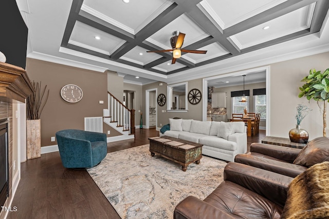 1037 Lila Ln, Raleigh, NC 27614 - living area featuring visible vents, baseboards, crown molding, and dark wood finished floors