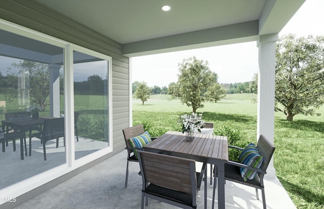 view of patio with outdoor dining area and a rural view