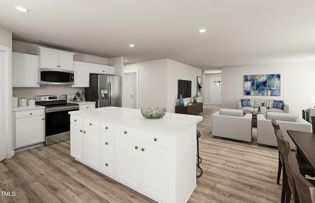 kitchen featuring light wood-style flooring, recessed lighting, and appliances with stainless steel finishes