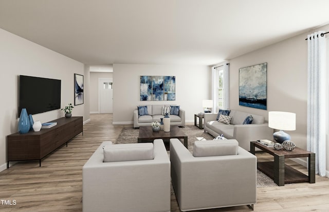 living area featuring baseboards and light wood-type flooring