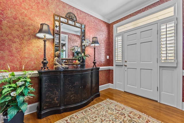 entryway featuring wallpapered walls and wood finished floors