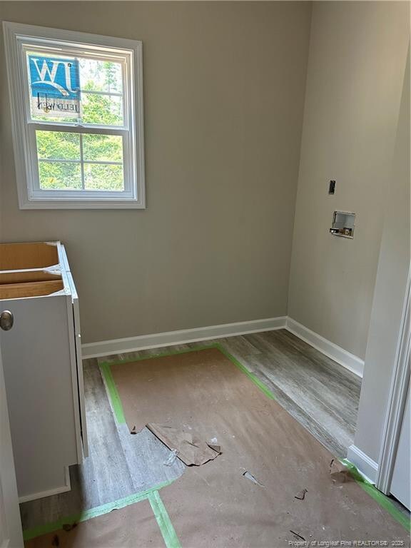 480 Dalton Dr, Lumber Bridge, NC 28357 - laundry area featuring baseboards